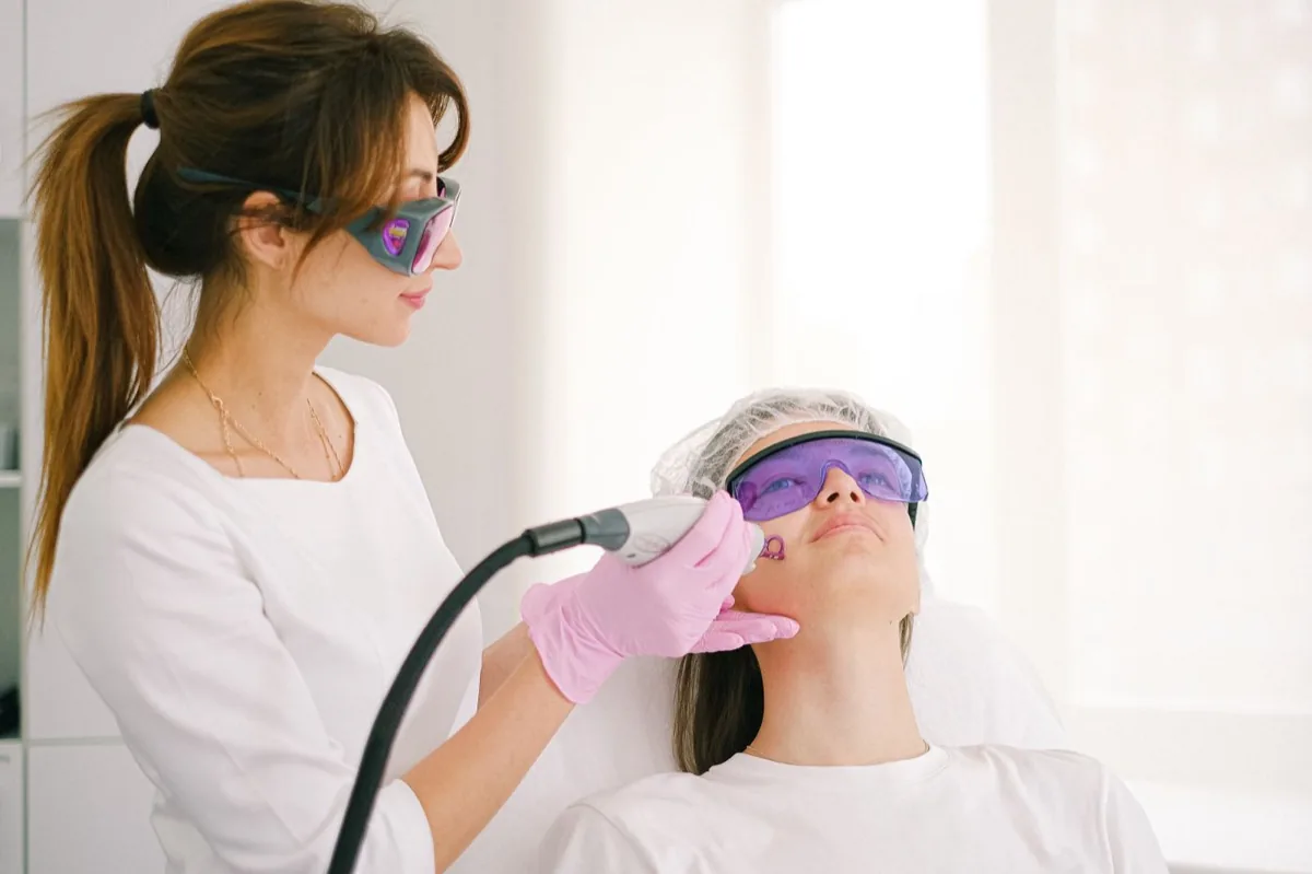 IPL facial treatment with protective eyewear, illustrating IPL Photofacial in Barrie at Simcoe Cosmetic Clinic